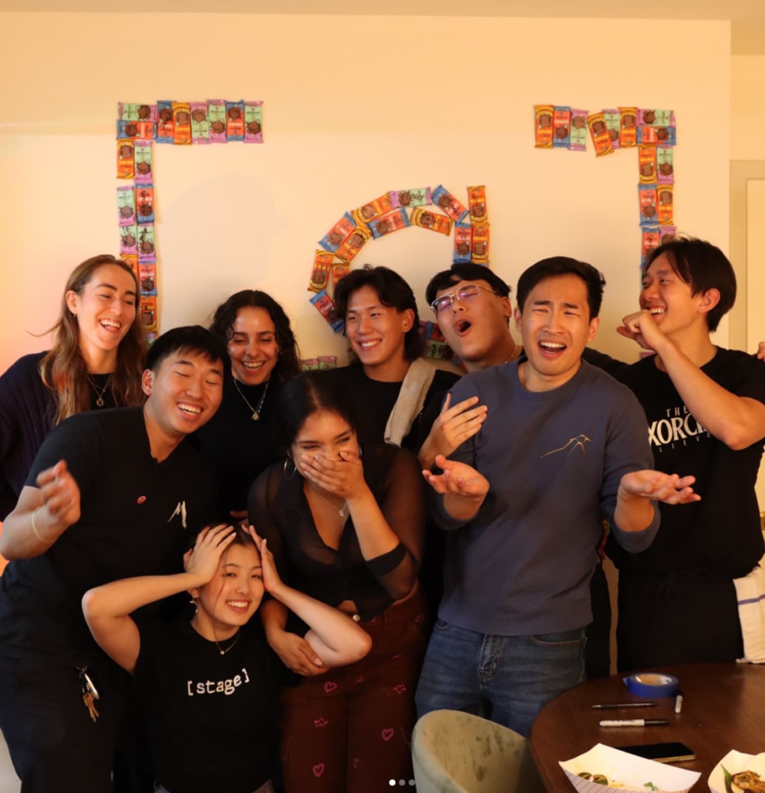The [ stage ] team celebrating after a dinner