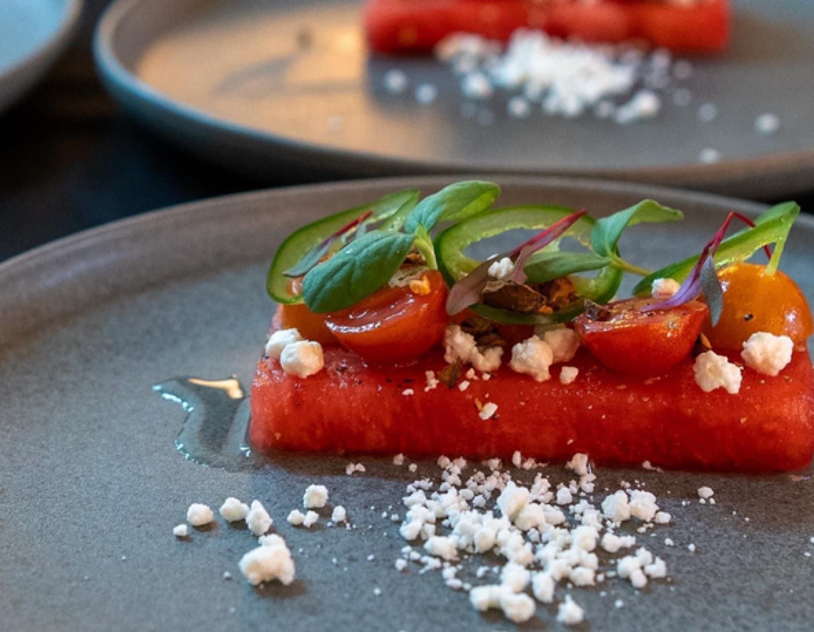 Compressed watermelon with feta and tomato