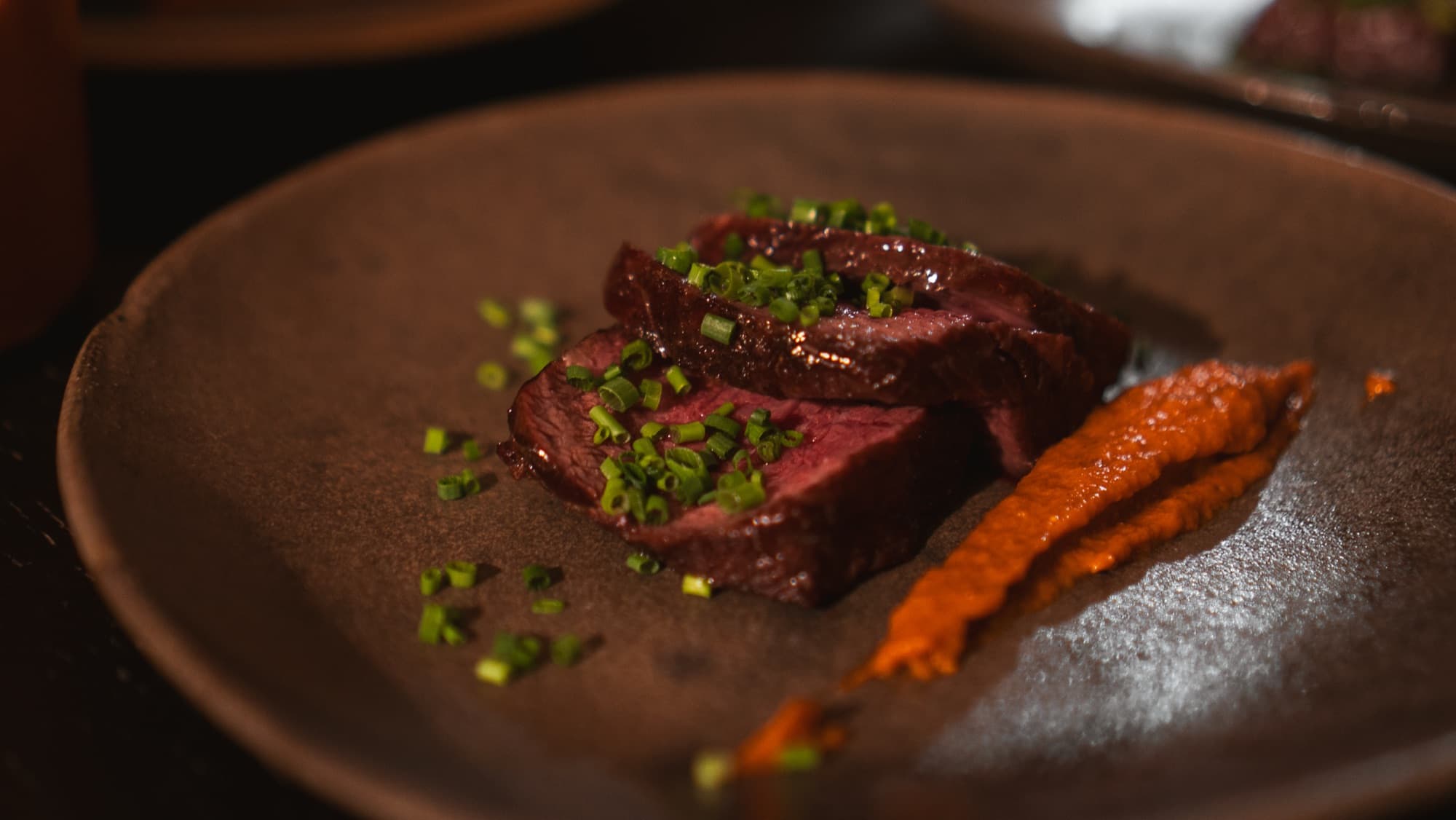 Braised short rib finished with scallion