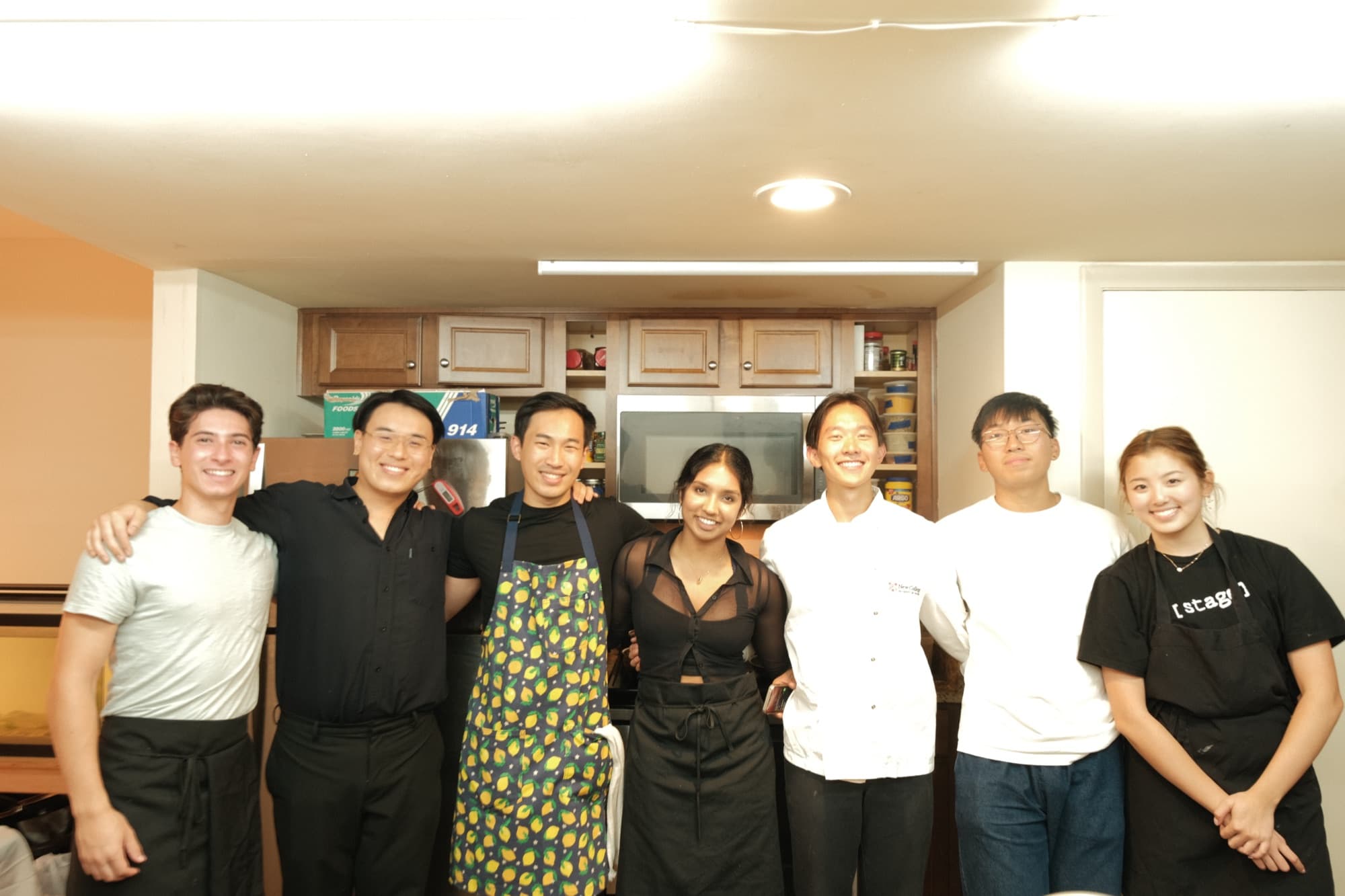 The team lined up in the kitchen after service